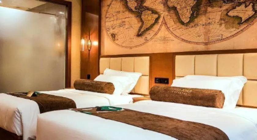 Bed in James Joyce Coffetel Xinyang Municipal Government Railway Station