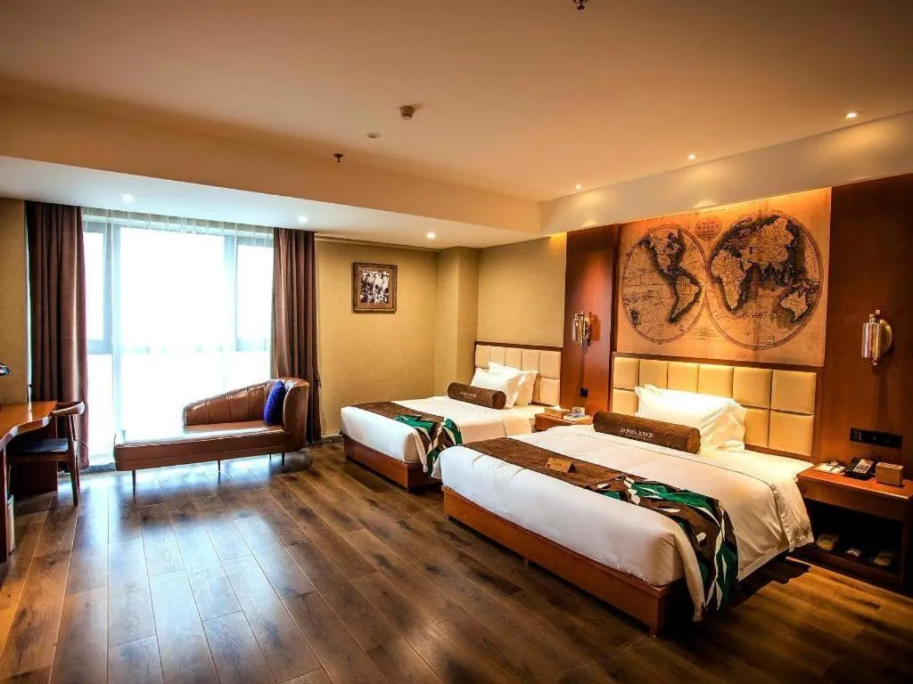 Bed in James Joyce Coffetel Xinyang Municipal Government Railway Station