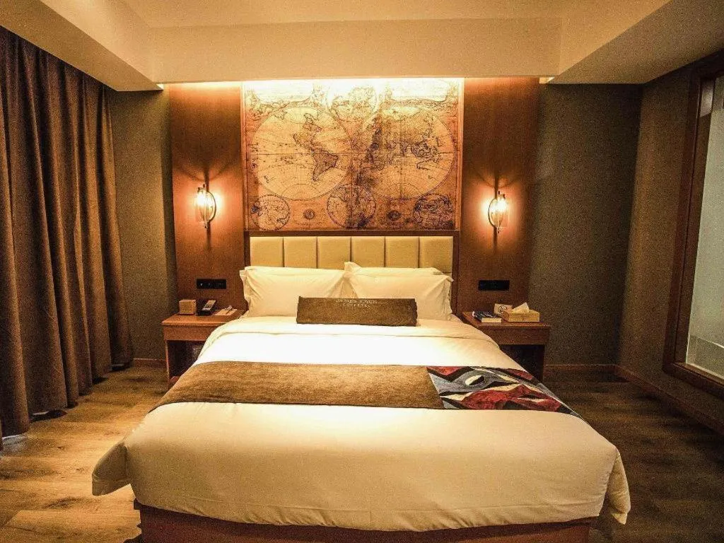 Bed in James Joyce Coffetel Xinyang Municipal Government Railway Station