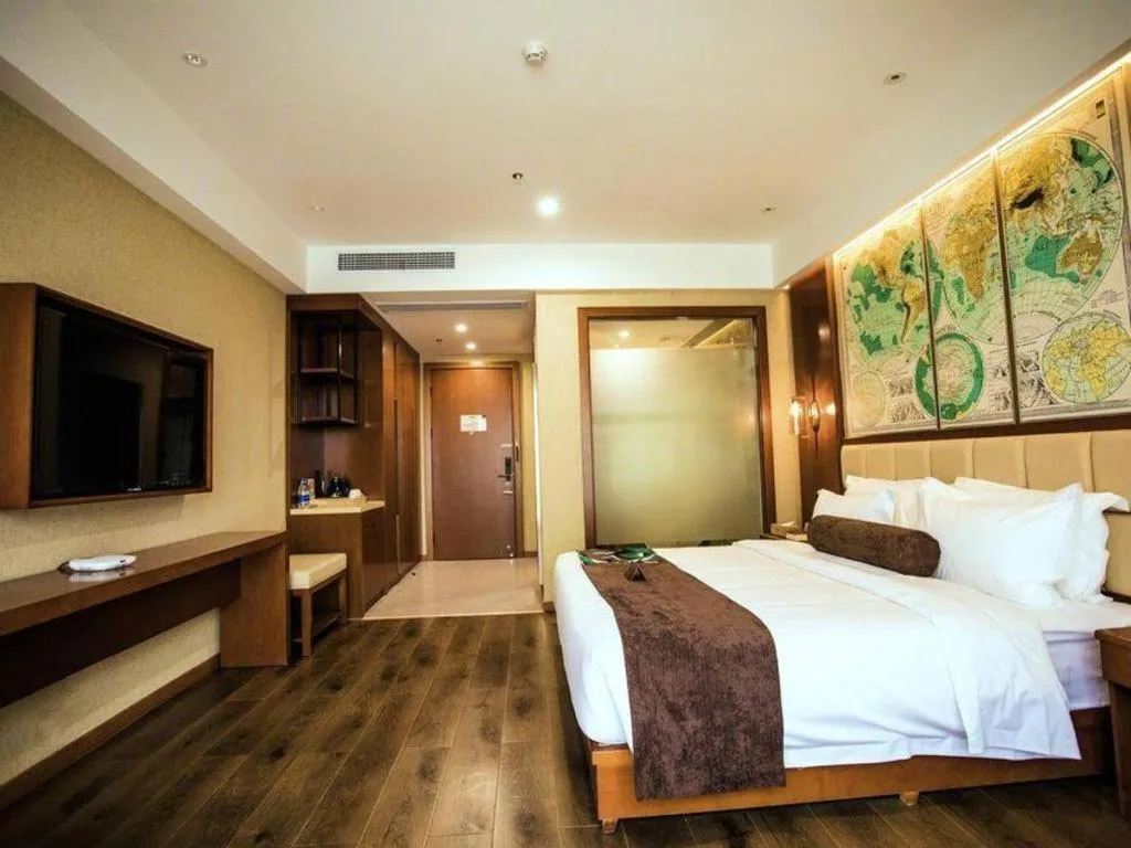 Bed in James Joyce Coffetel Xinyang Municipal Government Railway Station