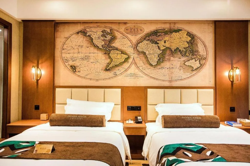 Bed in James Joyce Coffetel Xinyang Municipal Government Railway Station