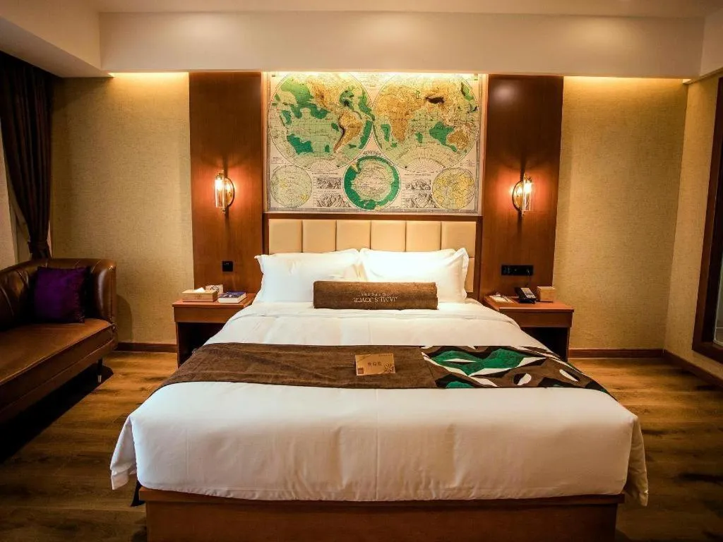 Bed in James Joyce Coffetel Xinyang Municipal Government Railway Station