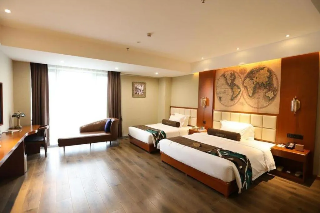 Bed in James Joyce Coffetel Xinyang Municipal Government Railway Station