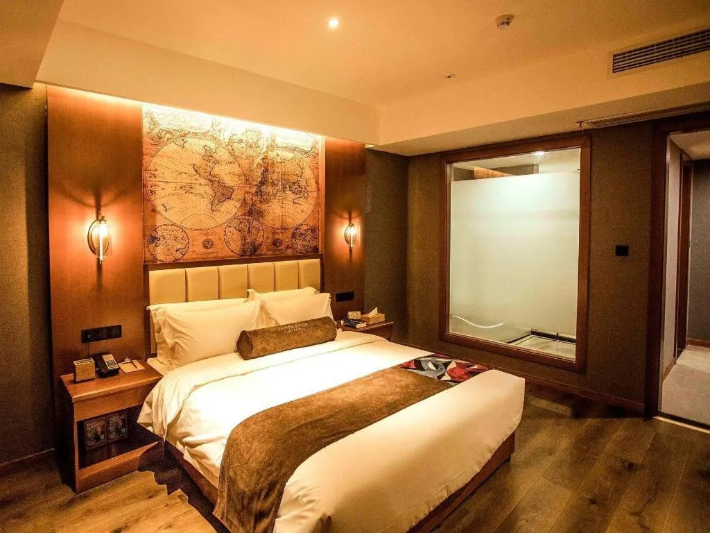 Bed in James Joyce Coffetel Xinyang Municipal Government Railway Station