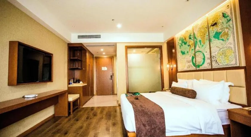 Bed in James Joyce Coffetel Xinyang Municipal Government Railway Station