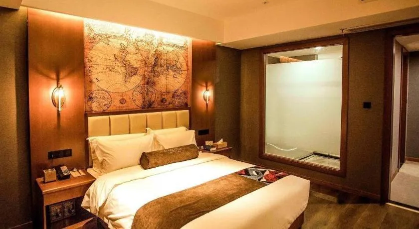 Bed in James Joyce Coffetel Xinyang Municipal Government Railway Station