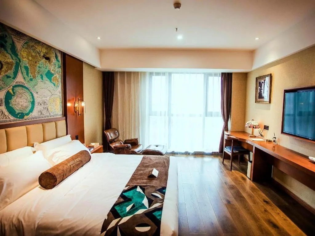 Bed in James Joyce Coffetel Xinyang Municipal Government Railway Station