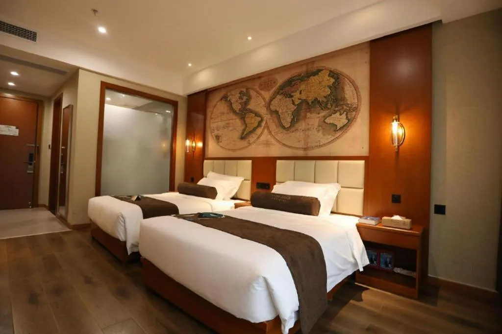 Bed in James Joyce Coffetel Xinyang Municipal Government Railway Station