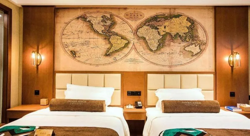 Bed in James Joyce Coffetel Xinyang Municipal Government Railway Station