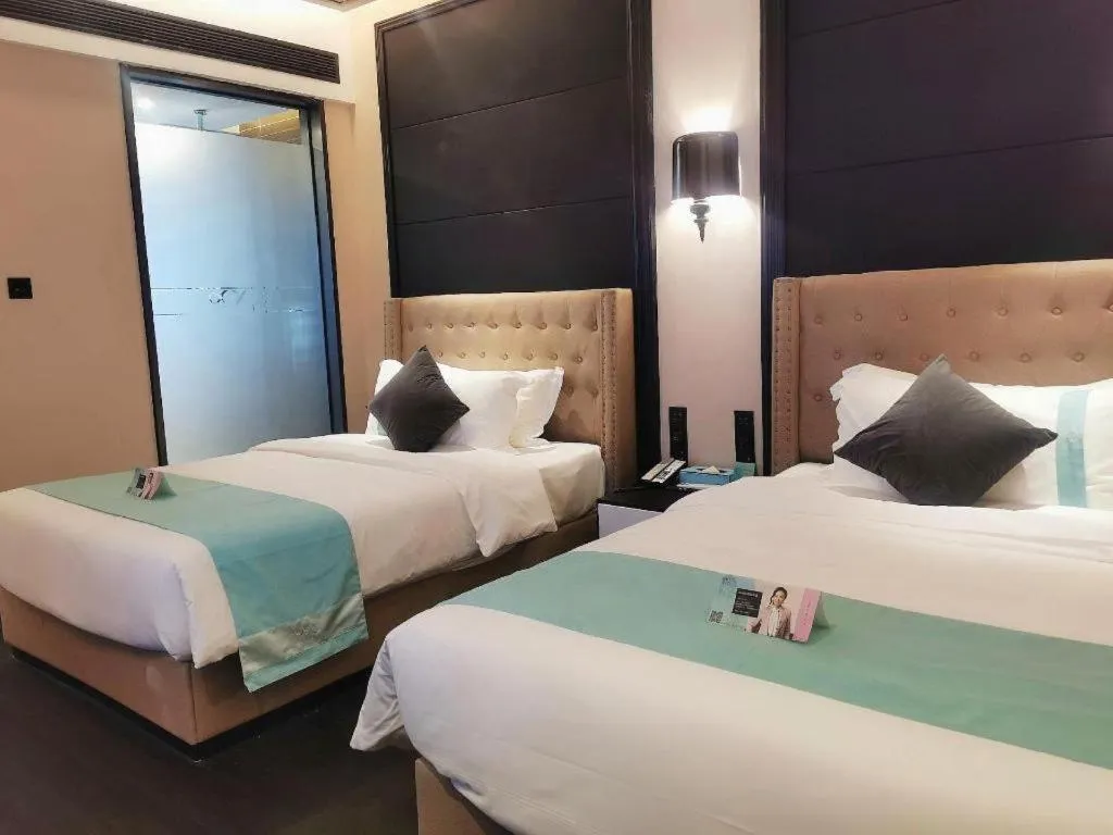 Bed in Xana Hotelle Guangzhou Luogang Science City Huangpi Metro Station
