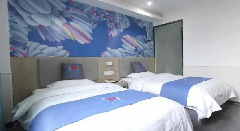 Bed in Pai Hotel Xuzhou Railway Station Bed in Pai Hotel Xuzhou Railway Station