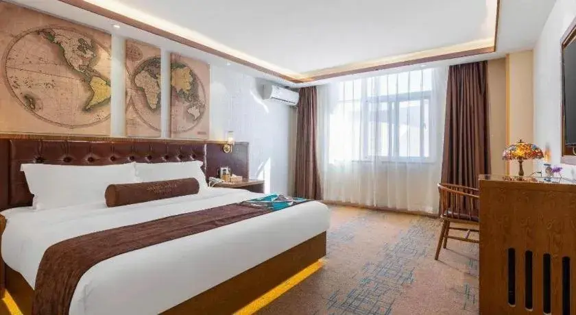 Bed in James Joyce Coffetel Lijiang Ancient City Dashuiche Bed in James Joyce Coffetel Lijiang Ancient City Dashuiche