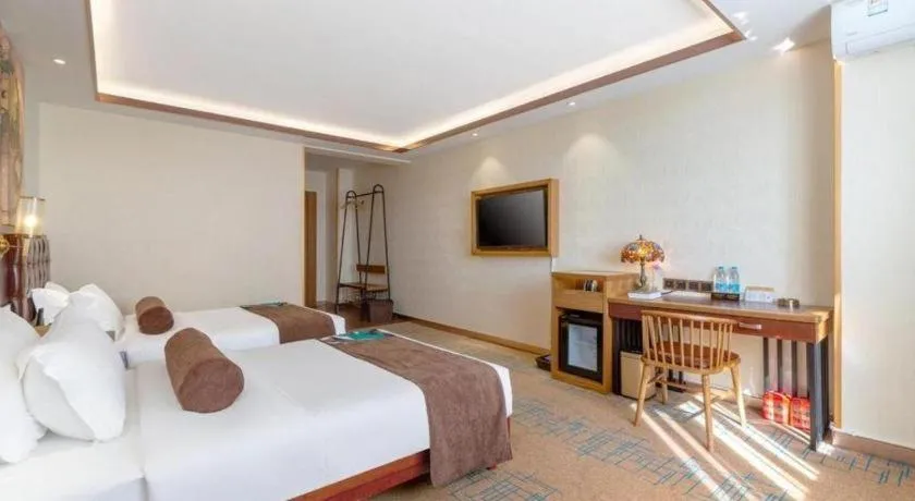 Bed in James Joyce Coffetel Lijiang Ancient City Dashuiche