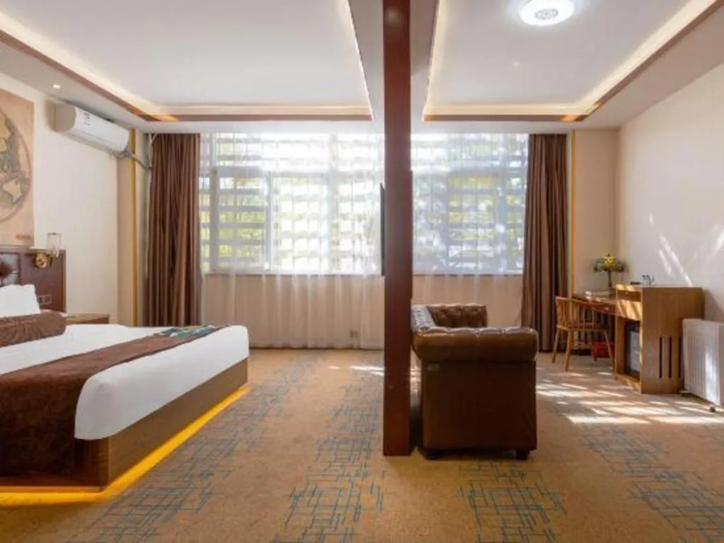 Bed in James Joyce Coffetel Lijiang Ancient City Dashuiche