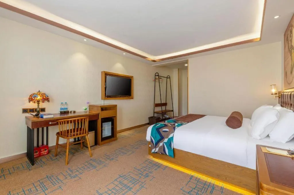 Bed in James Joyce Coffetel Lijiang Ancient City Dashuiche