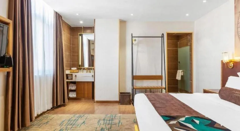 Bed in James Joyce Coffetel Lijiang Ancient City Dashuiche