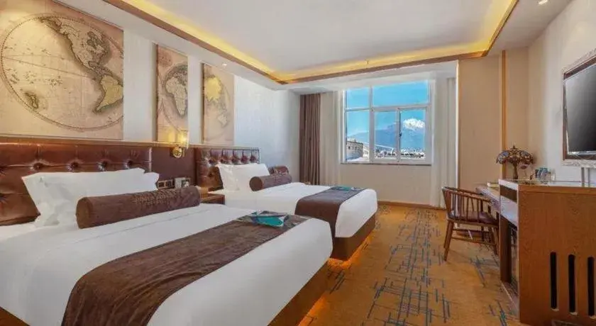 Bed in James Joyce Coffetel Lijiang Ancient City Dashuiche Bed in James Joyce Coffetel Lijiang Ancient City Dashuiche