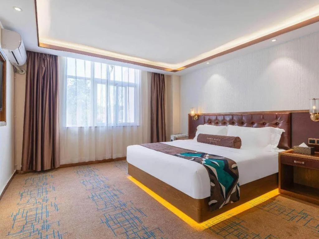 Bed in James Joyce Coffetel Lijiang Ancient City Dashuiche