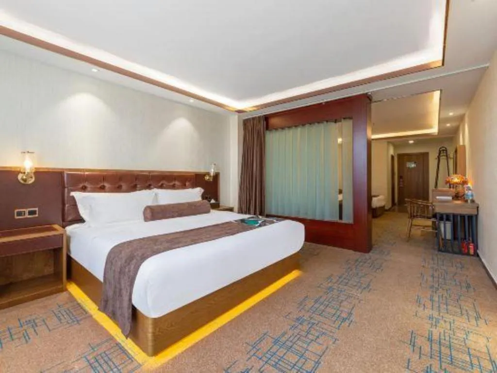 Bed in James Joyce Coffetel Lijiang Ancient City Dashuiche