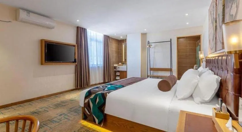 Bed in James Joyce Coffetel Lijiang Ancient City Dashuiche