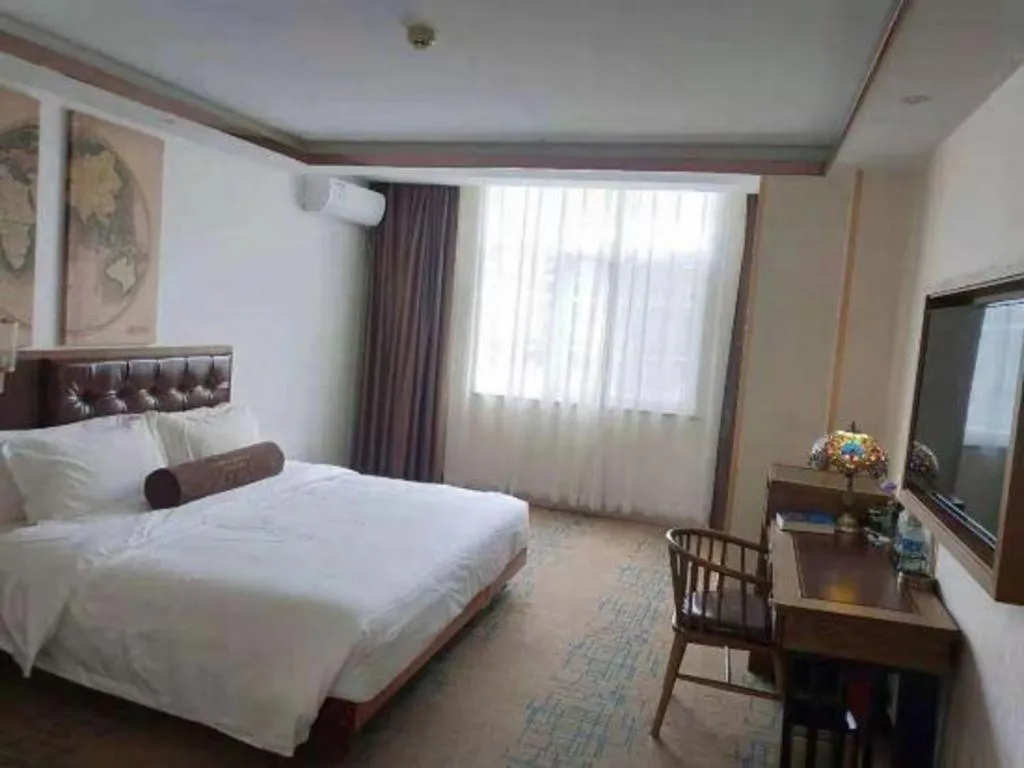 Bed in James Joyce Coffetel Lijiang Ancient City Dashuiche