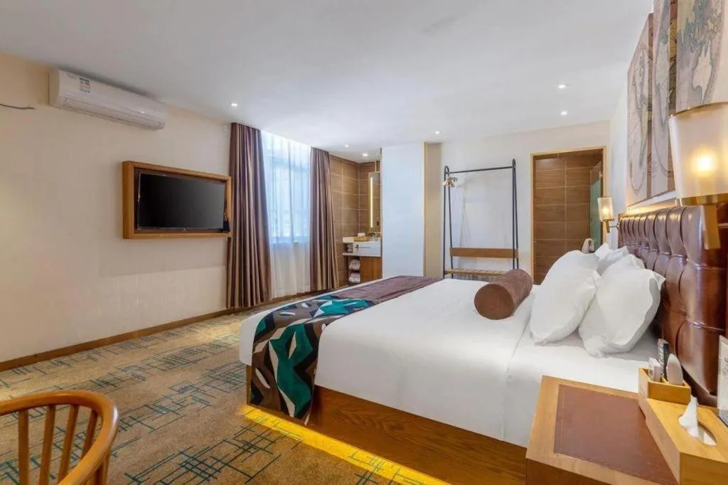 Bed in James Joyce Coffetel Lijiang Ancient City Dashuiche