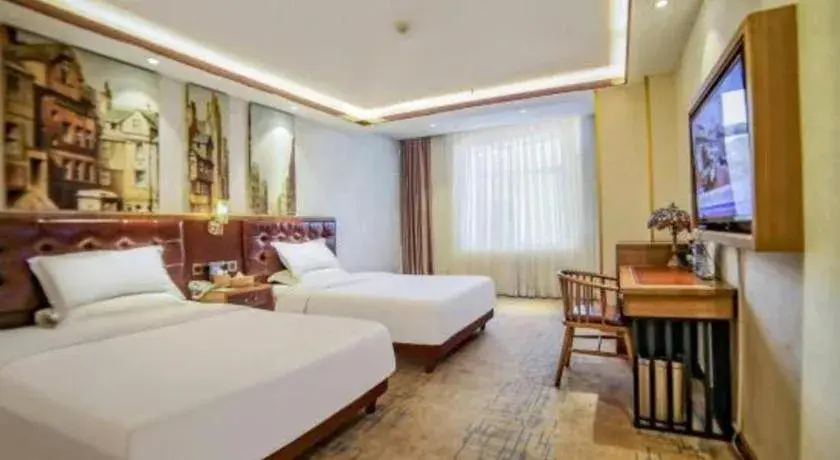 Bed in James Joyce Coffetel Lijiang Ancient City Dashuiche Bed in James Joyce Coffetel Lijiang Ancient City Dashuiche