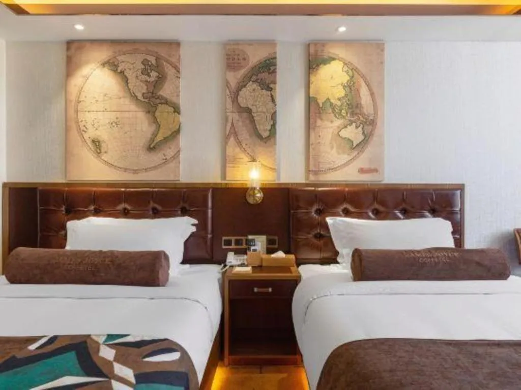 Bed in James Joyce Coffetel Lijiang Ancient City Dashuiche