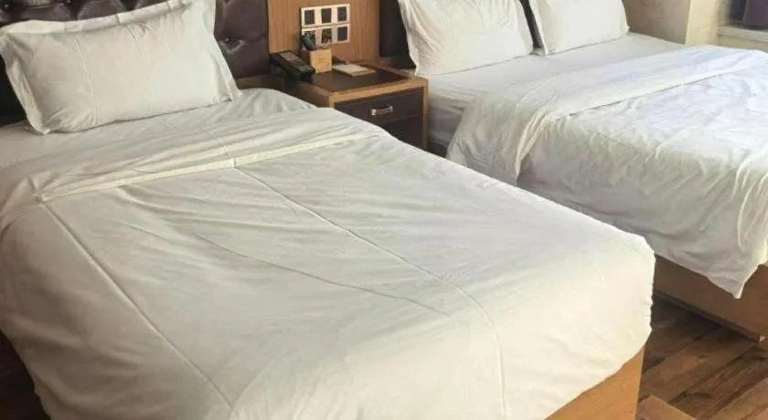 Bed in James Joyce Coffetel Beijing Tongzhou Guoyuan Metro Station