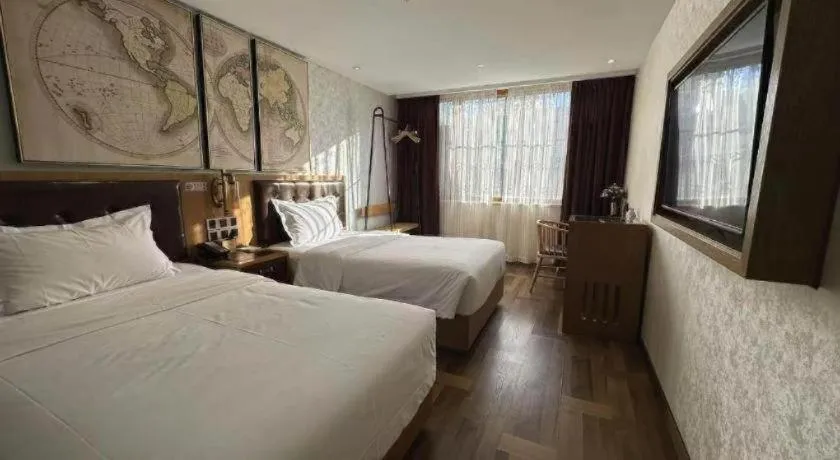 Bed in James Joyce Coffetel Beijing Tongzhou Guoyuan Metro Station