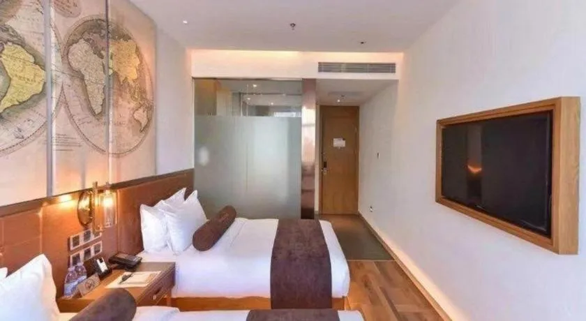 Bed in James Joyce Coffetel Beijing Tongzhou Guoyuan Metro Station