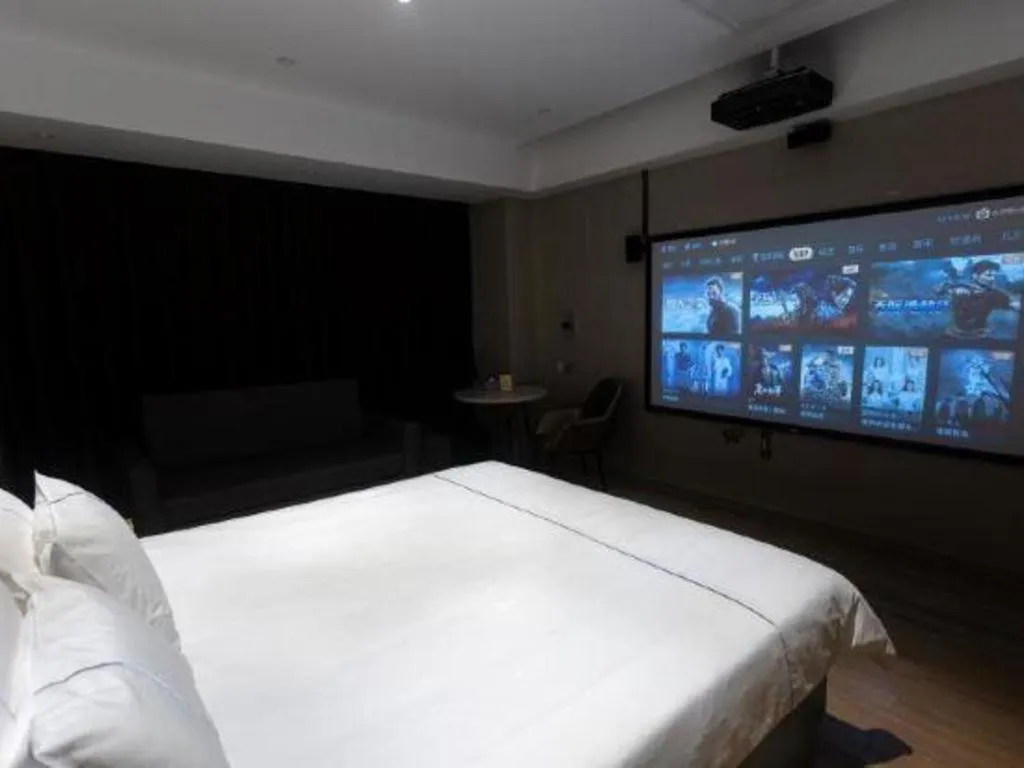 Bed in Magnotel Hotel Guangyuan Nanhe Bus Station Beijing Road