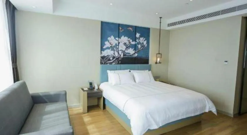 Bed in Magnotel Hotel Guangyuan Nanhe Bus Station Beijing Road