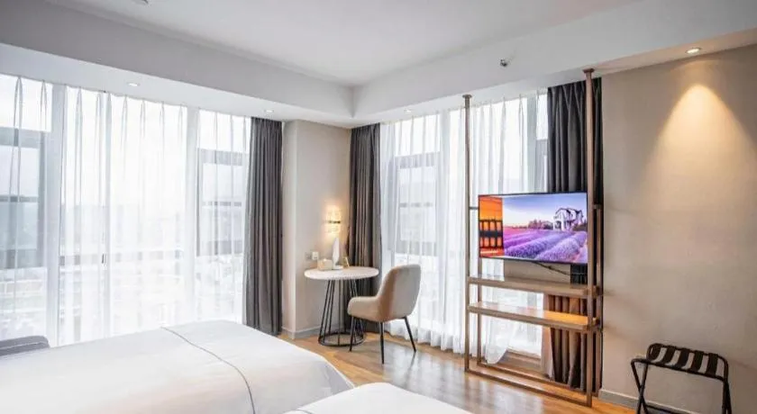 Bed in Magnotel Hotel Guangyuan Nanhe Bus Station Beijing Road