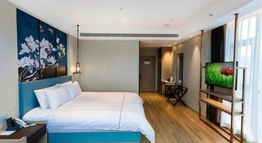 Bed in Magnotel Hotel Guangyuan Nanhe Bus Station Beijing Road