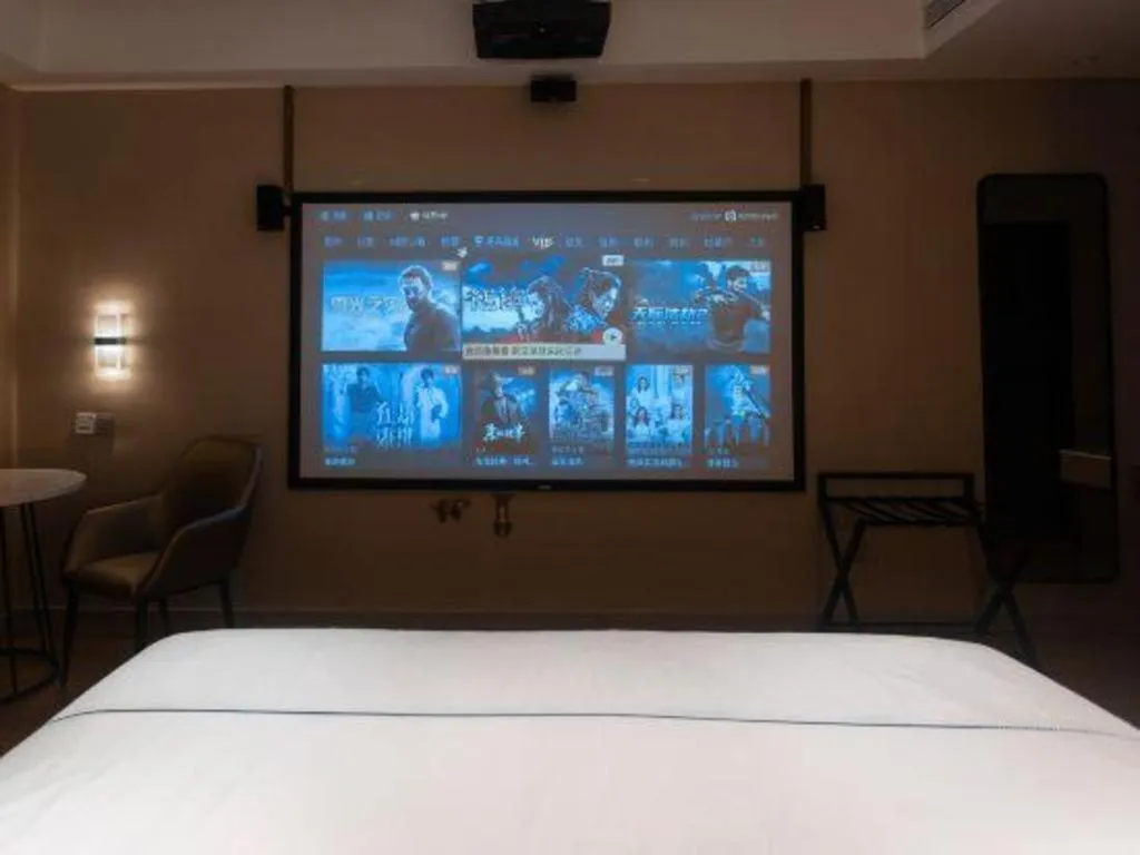 Bed in Magnotel Hotel Guangyuan Nanhe Bus Station Beijing Road