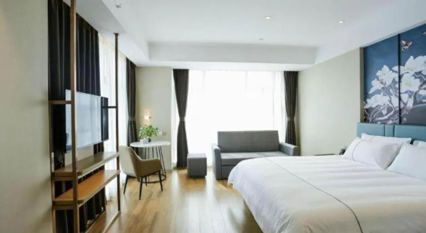 Bed in Magnotel Hotel Guangyuan Nanhe Bus Station Beijing Road