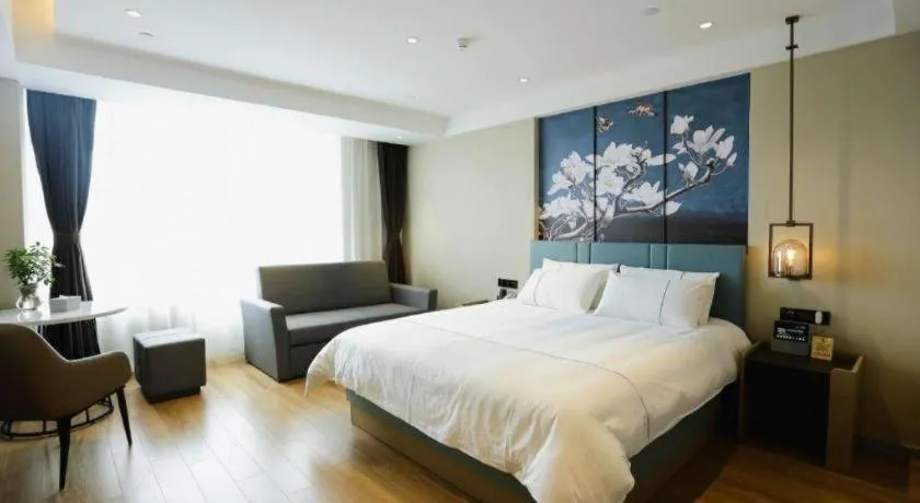 Bed in Magnotel Hotel Guangyuan Nanhe Bus Station Beijing Road