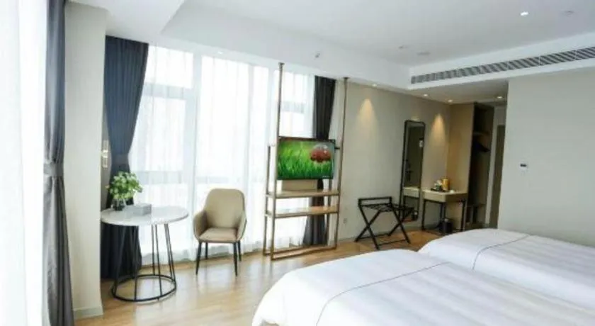 Bed in Magnotel Hotel Guangyuan Nanhe Bus Station Beijing Road