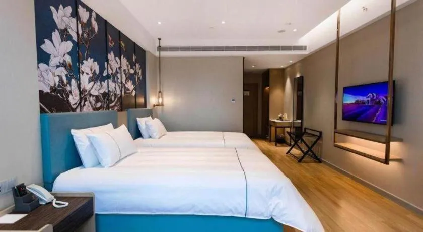 Bed in Magnotel Hotel Guangyuan Nanhe Bus Station Beijing Road