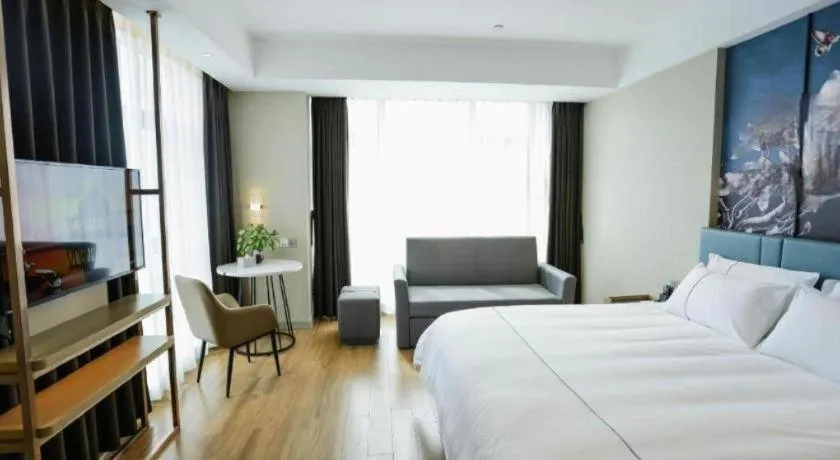 Bed in Magnotel Hotel Guangyuan Nanhe Bus Station Beijing Road