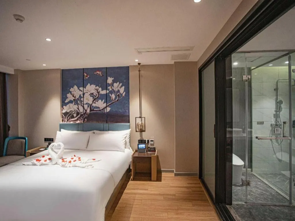 Bed in Magnotel Hotel Guangyuan Nanhe Bus Station Beijing Road