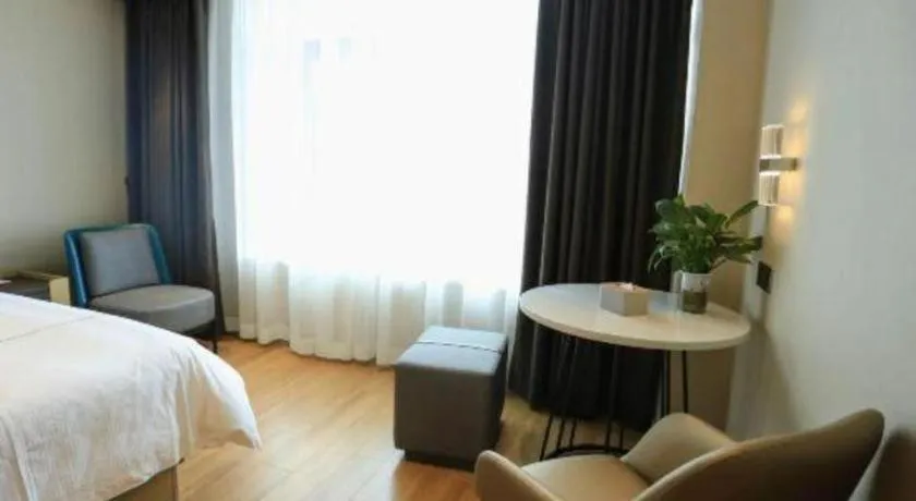 Bed in Magnotel Hotel Guangyuan Nanhe Bus Station Beijing Road