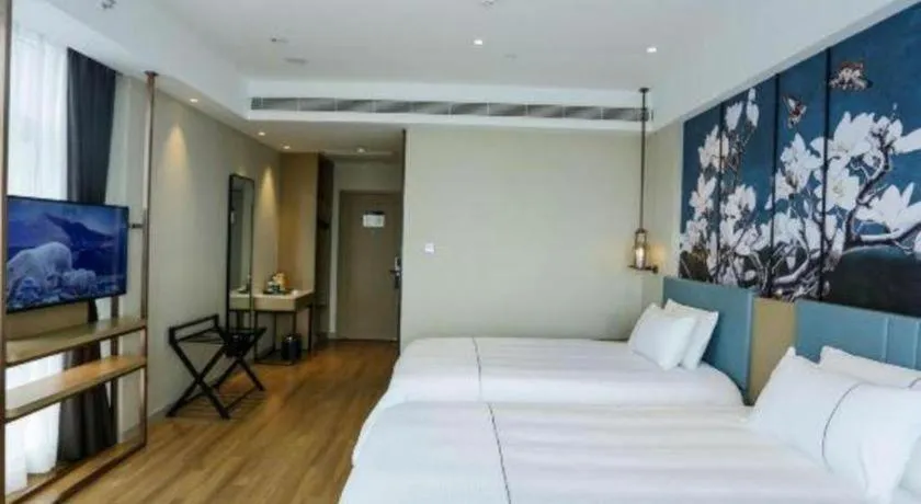 Bed in Magnotel Hotel Guangyuan Nanhe Bus Station Beijing Road