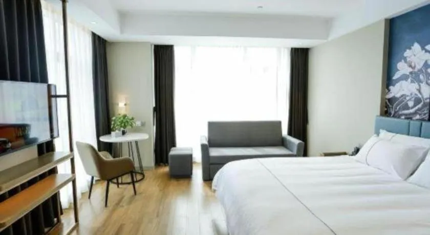 Bed in Magnotel Hotel Guangyuan Nanhe Bus Station Beijing Road