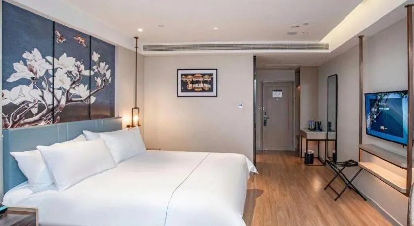 Bed in Magnotel Hotel Guangyuan Nanhe Bus Station Beijing Road