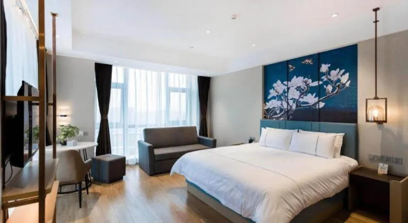 Bed in Magnotel Hotel Guangyuan Nanhe Bus Station Beijing Road