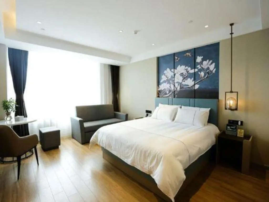 Bed in Magnotel Hotel Guangyuan Nanhe Bus Station Beijing Road