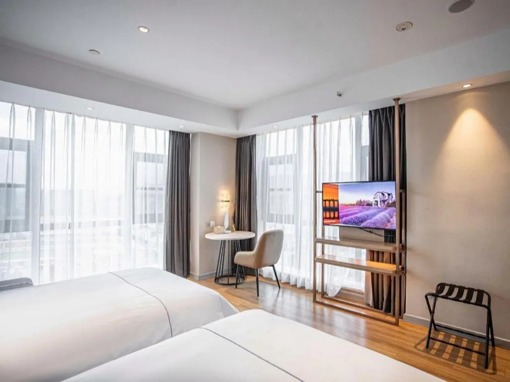 Bed in Magnotel Hotel Guangyuan Nanhe Bus Station Beijing Road