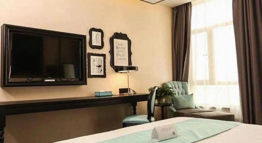 Bed in Xana Hotelle Binzhou Yangxin